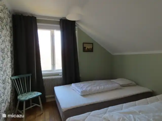 Älvsjö Anderssons en Suecia, Värmland, Lesjöfors - casa vacacional Dormitorio 4 en el 1er piso. Aquí hay dos camas individuales.