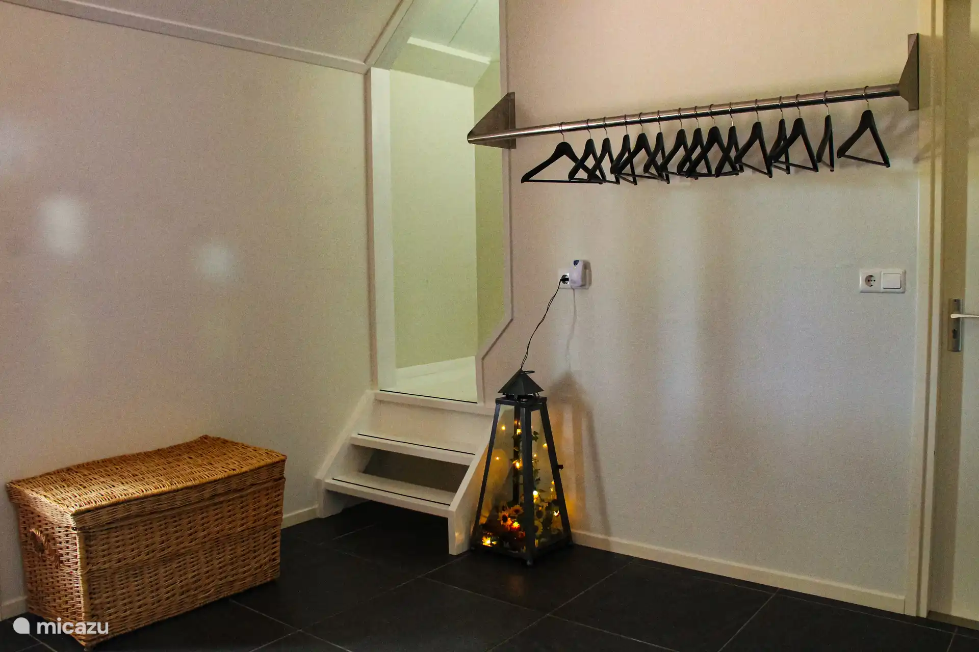 Hall avec escalier jusqu’au sommet