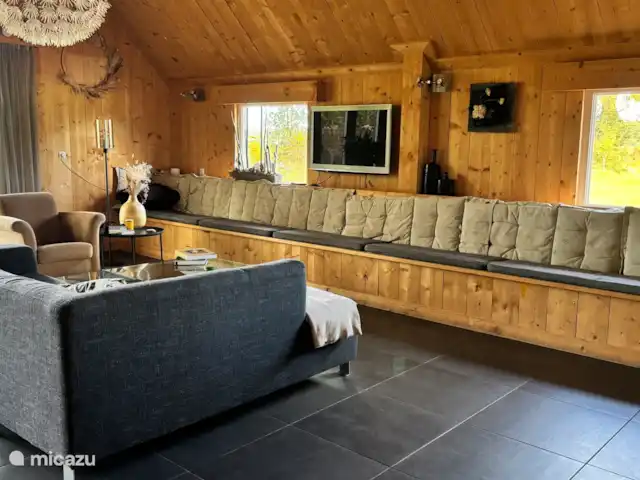 Jannahoeve huren in Nederland, Overijssel, Denekamp - boerderij Woonkamer met uitzicht op de natuur