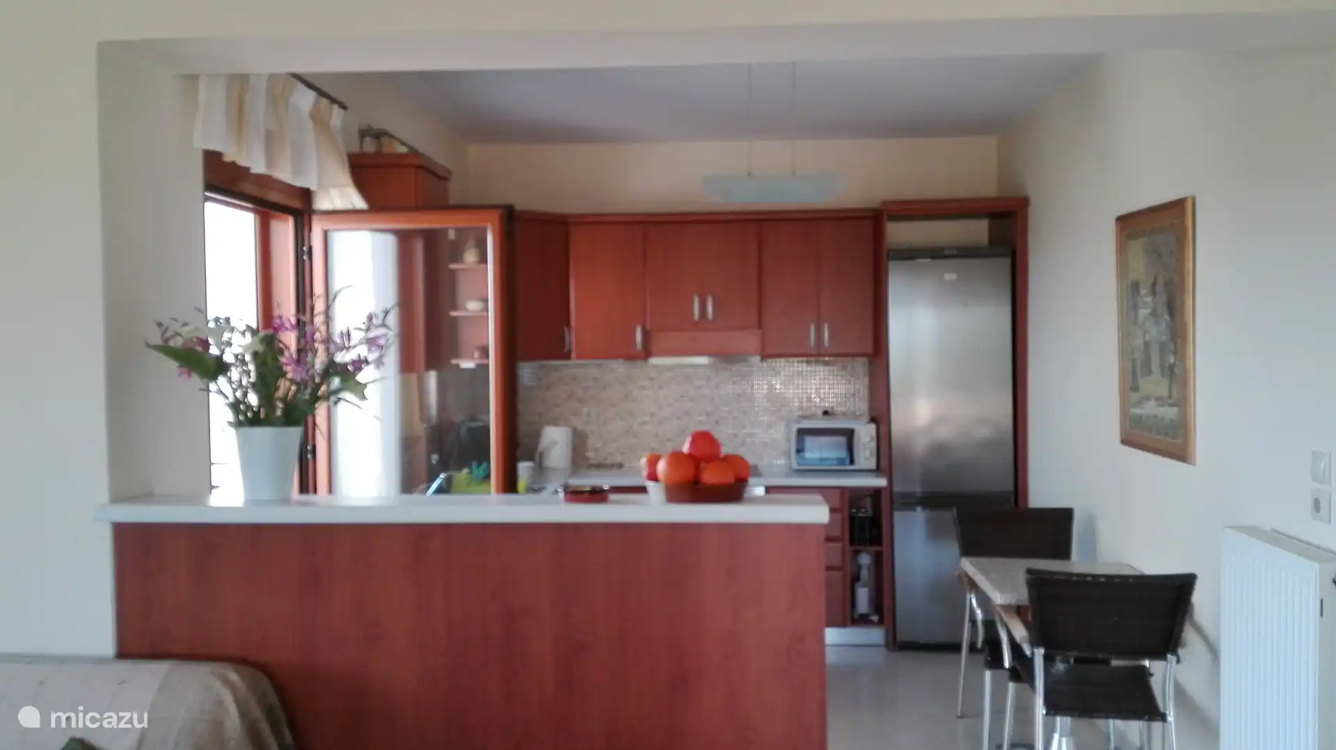 Offener Wohnraum mit Küche, Wohn- und Essbereich