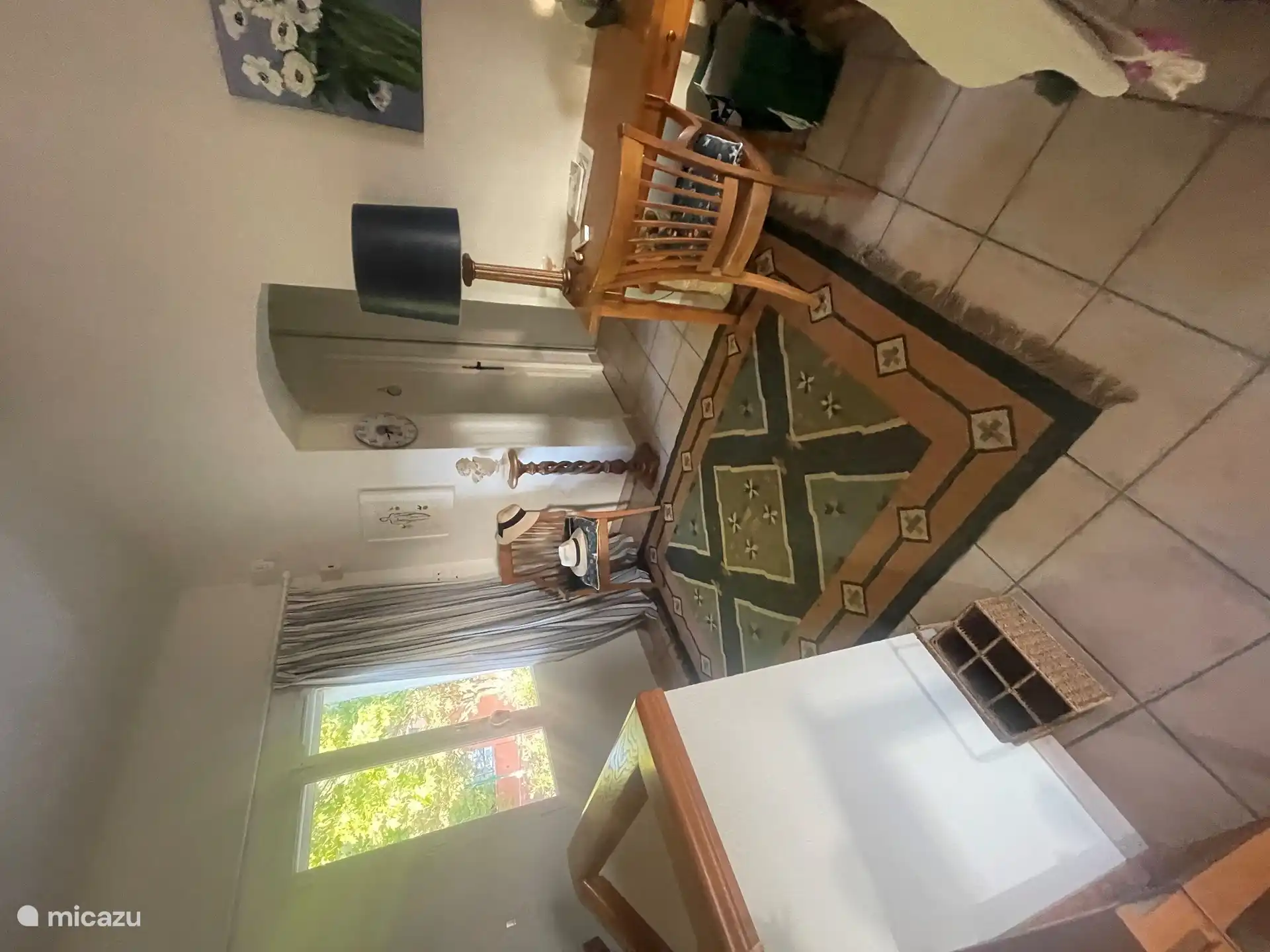 Bovenaan de trap die naar de eerste verdieping leidt