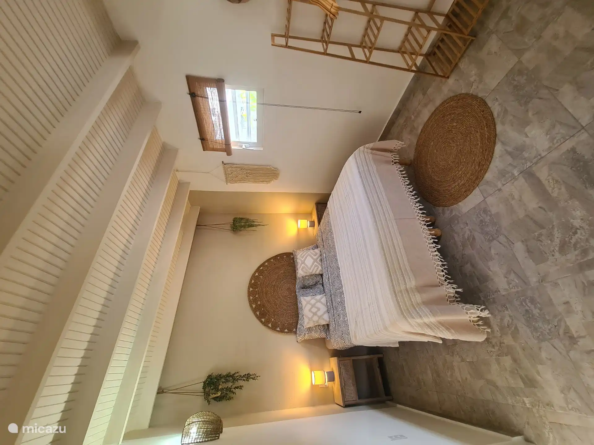 Bedroom 1, this contains the bathroom, with a door. beds can also be separated on request, there is normally a topping on them.