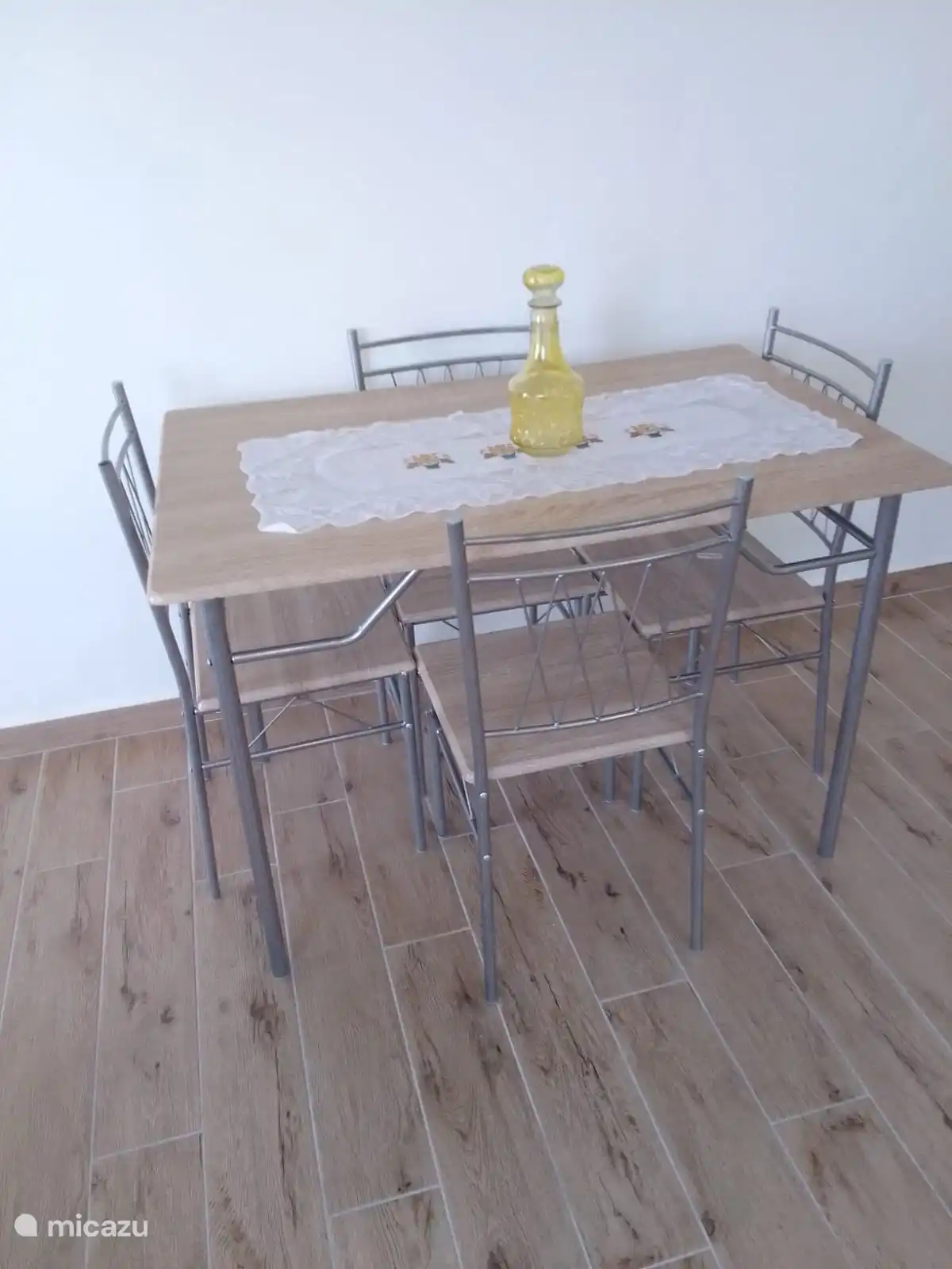 A nice little dining area with matching chairs