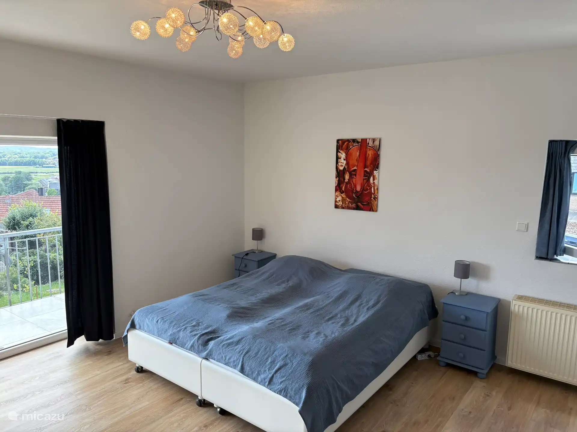 Large bedroom with balcony. 1 bed 180x210 with 2 mattresses