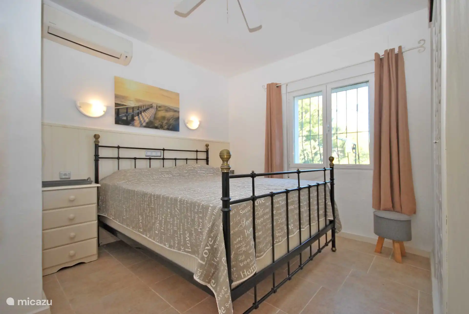 master bedroom upstairs with air conditioning and en suite bathroom