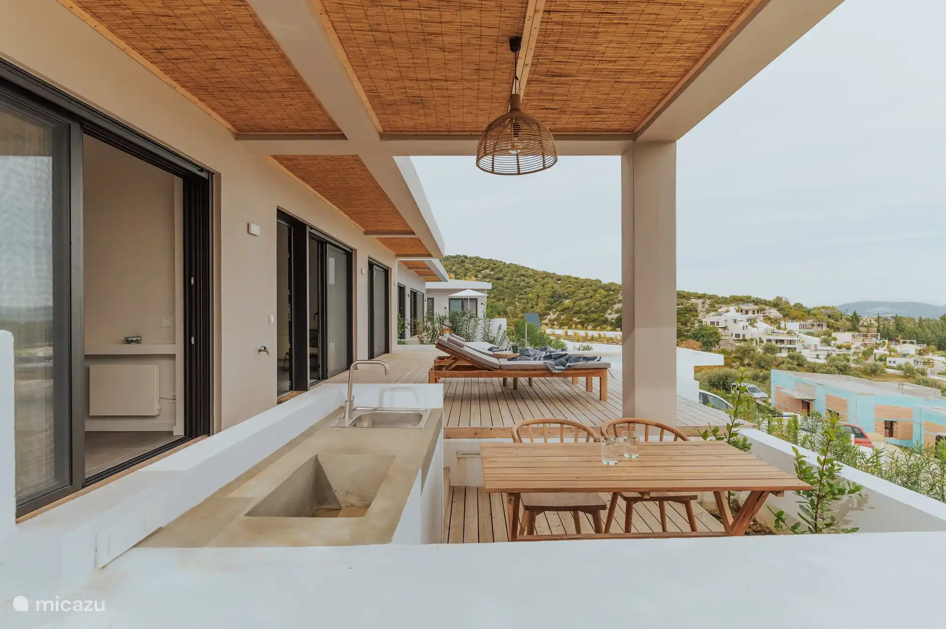 Bamboo pergola with outdoor kitchen