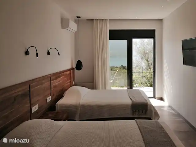 Villa Iris  en Grecia, Gracia Central, Paleros - villa Habitación con dos camas individuales.