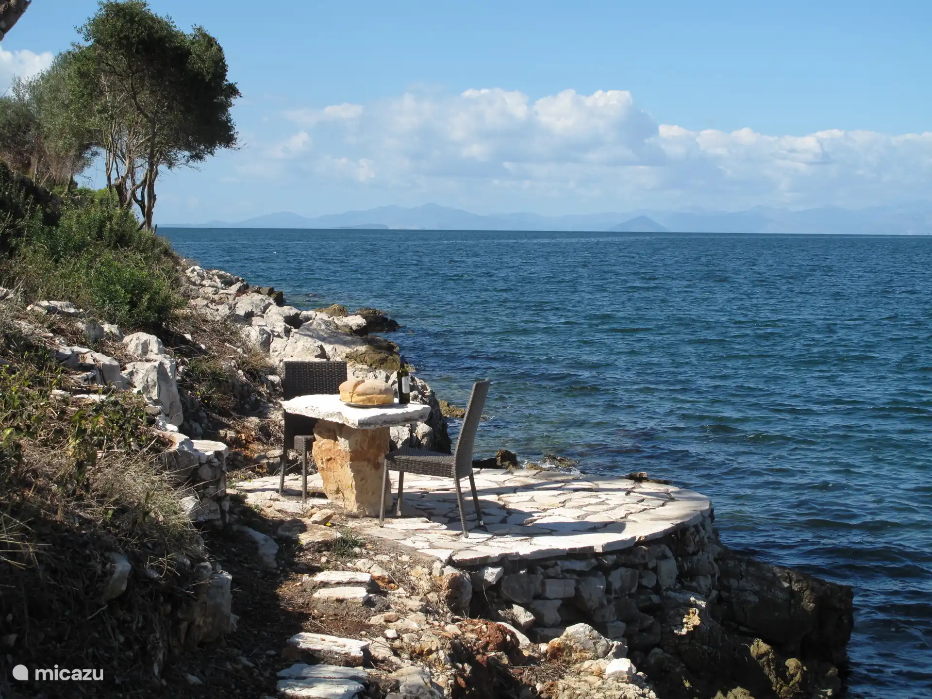 Seafront table for two people