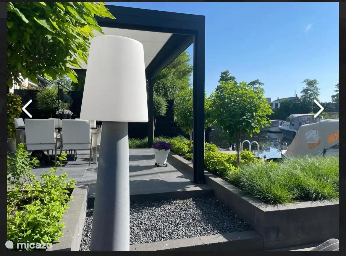 Schön angelegter Garten mit Veranda