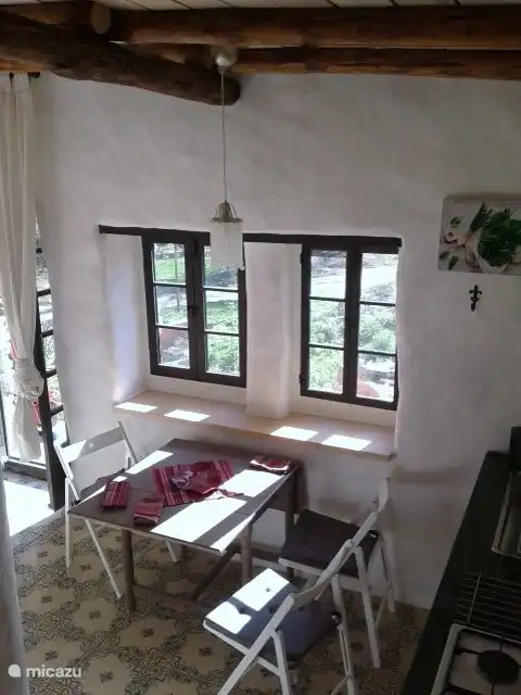 View from bed to dining table