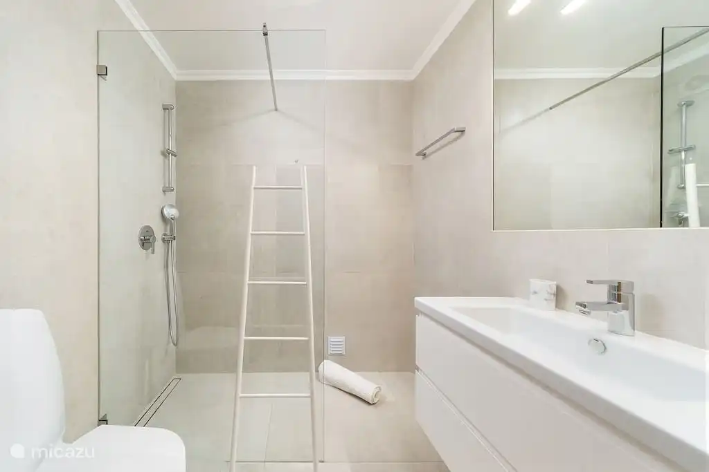 Suite slaapkamer met tweepersoonsbed