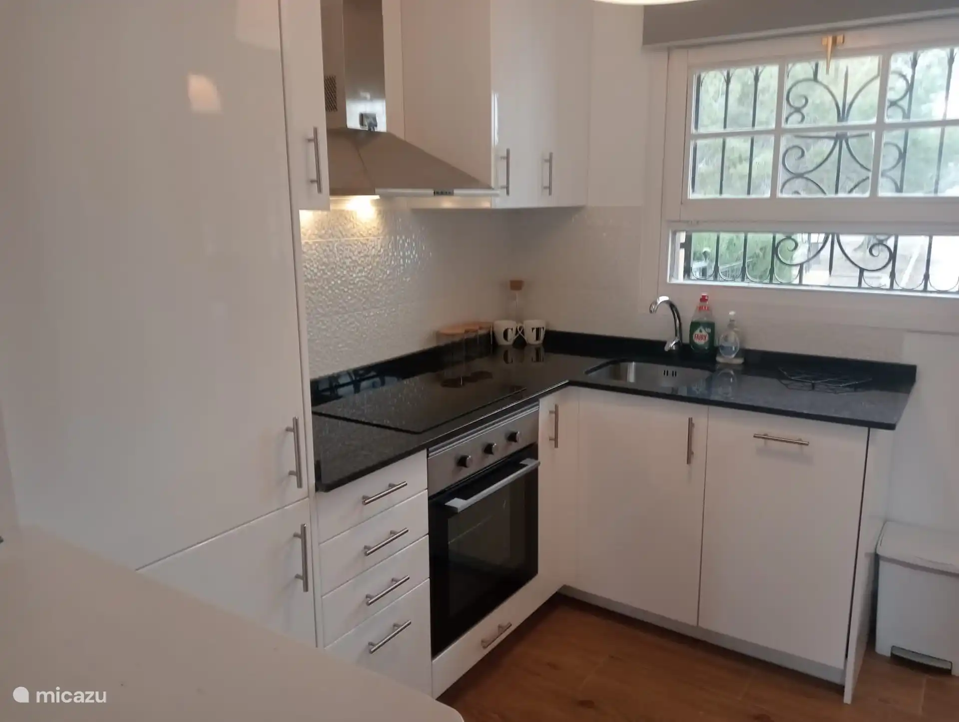 New kitchen with built-in appliances and dishwasher