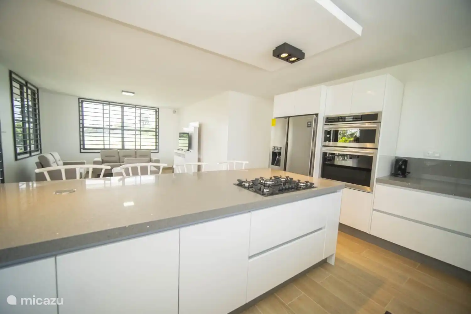 kitchen island with glass on gas hob