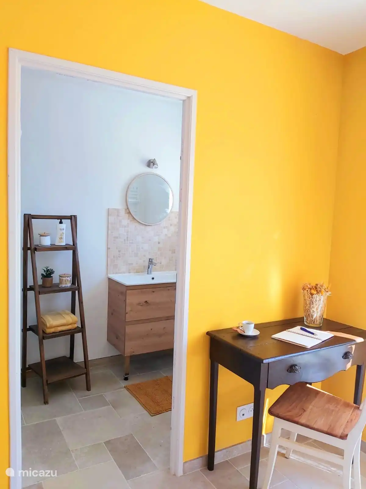 Bedroom 2 with access to a bathroom with sink and shower.