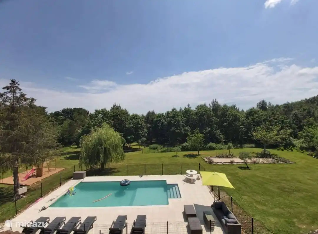 the playground equipment, swimming pool and pétanque court that you absolutely can use! Located a little further on the domain.