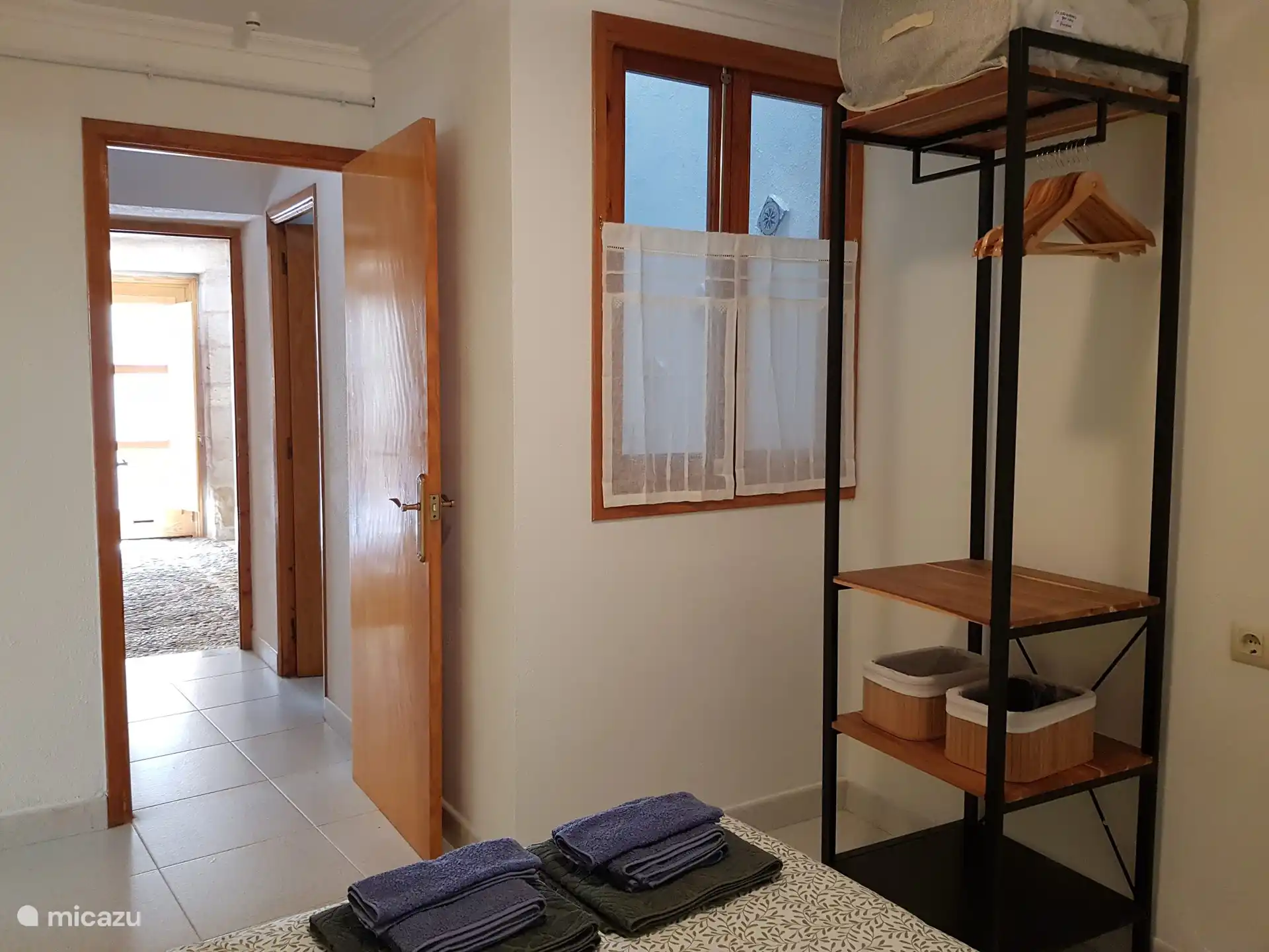 Bedroom with light shaft and view