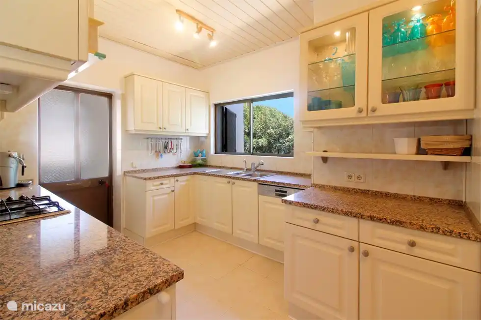 A spacious, neat kitchen with everything you need. Perfect for cooking together and enjoying delicious meals 