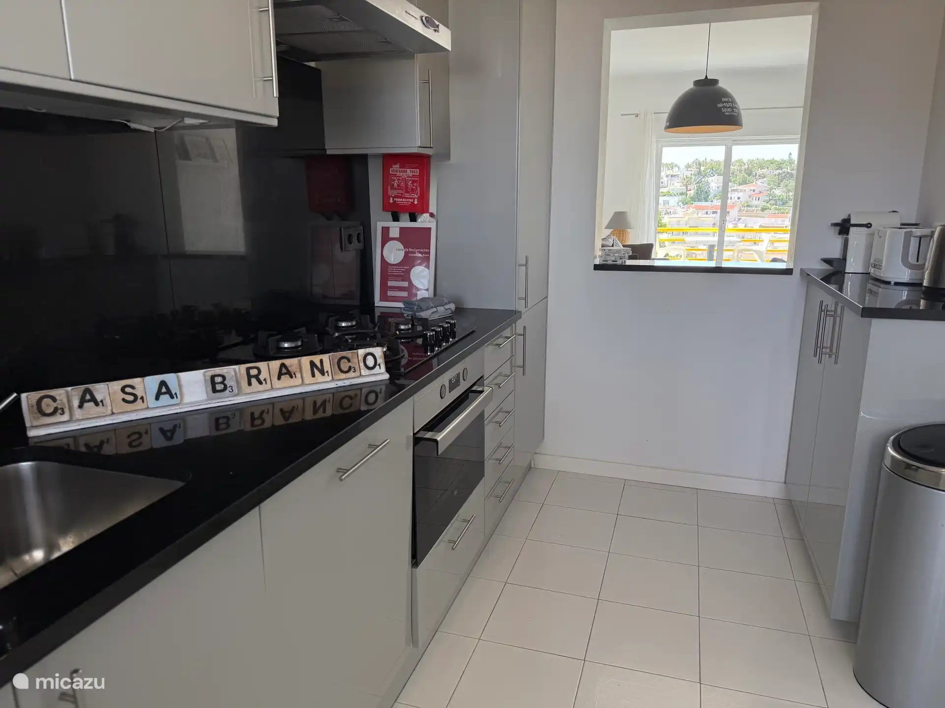 Spacious open kitchen overlooking the balcony
