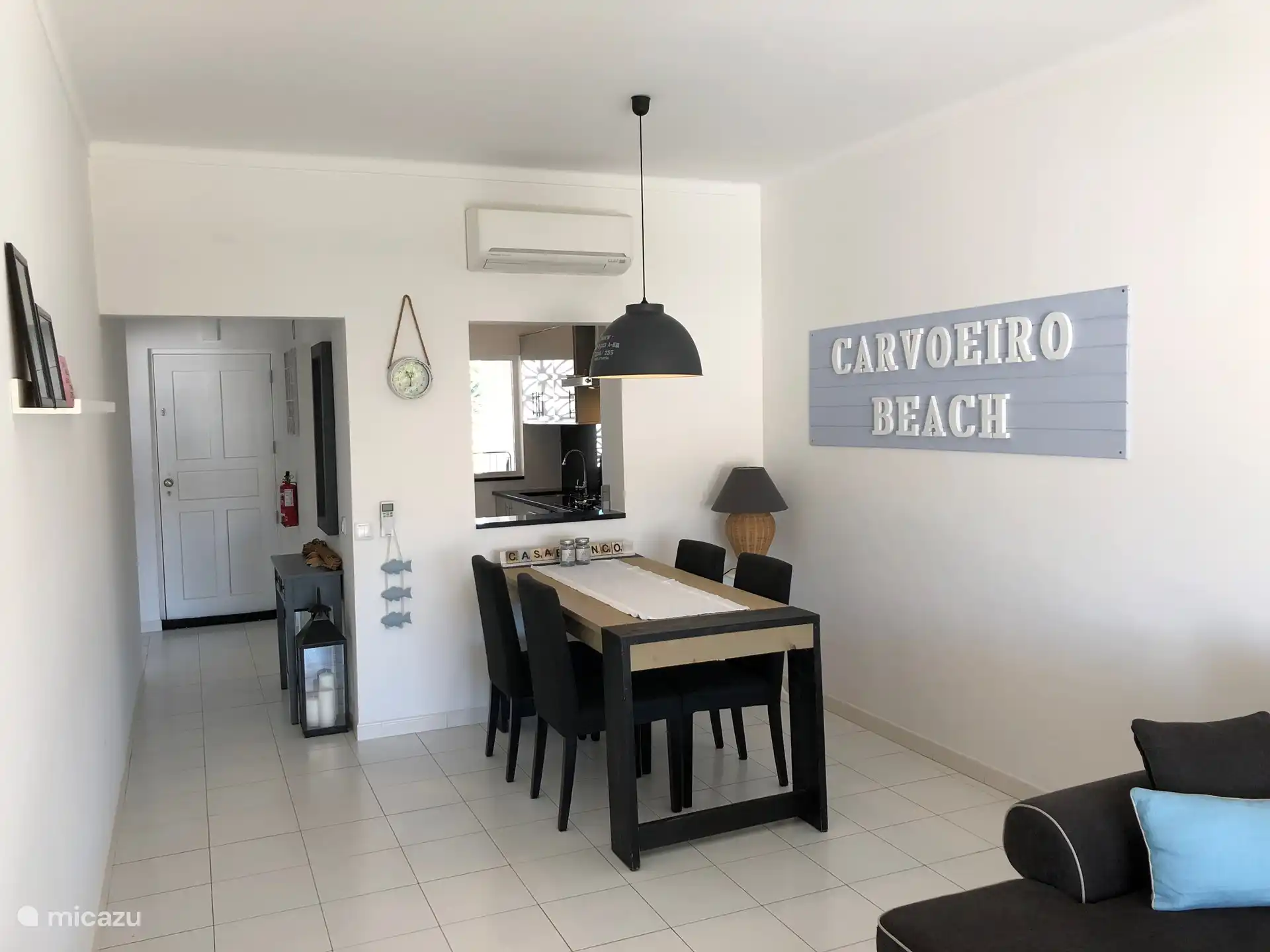 Spacious living-dining room with air conditioning and unobstructed views