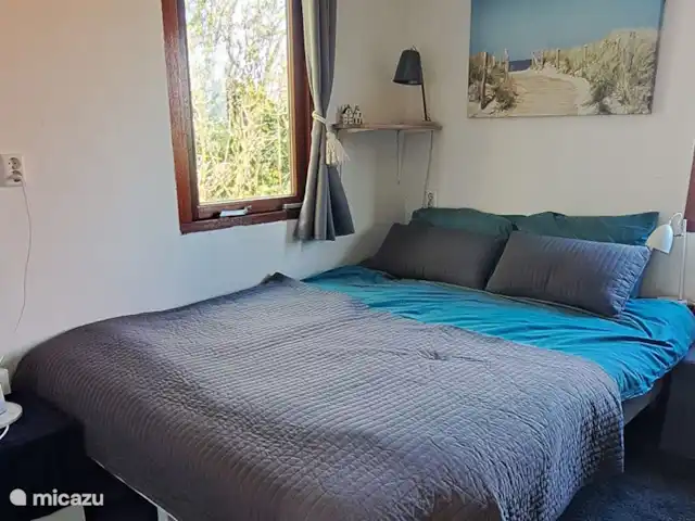 Wandelen, Nederland, Noord-Holland, Schoorldam, tiny house Maries Home Bed in slaapkamer