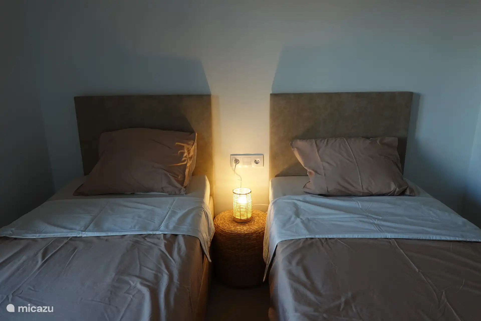 2nd bedroom with separate beds, with direct access to the terrace and with shutters.