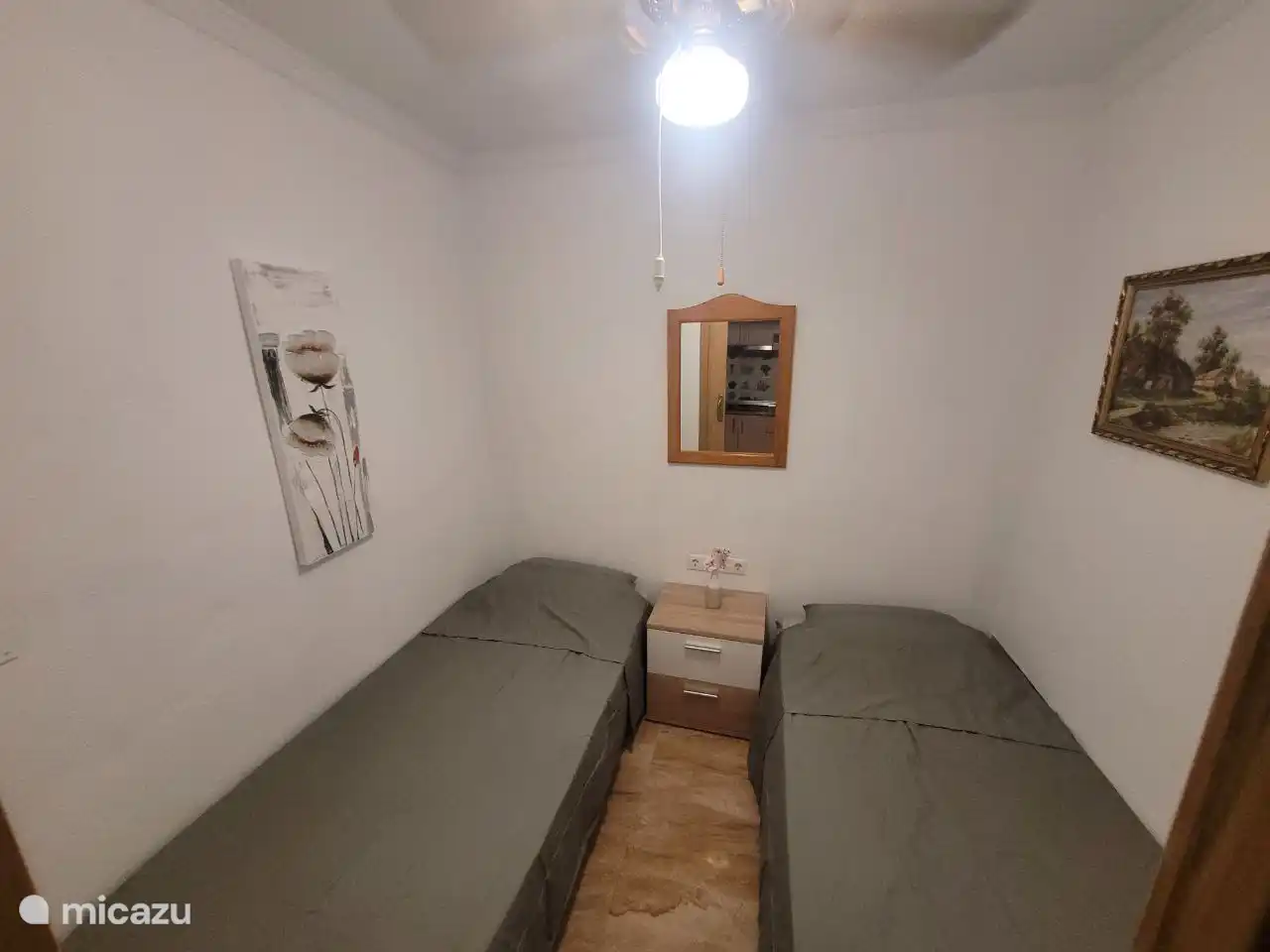 Schlafzimmer im Erdgeschoss. ausgestattet mit 2 Einzelbetten.