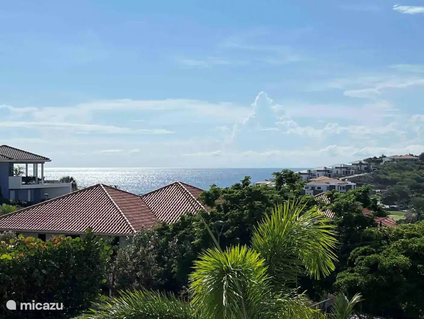 Sea view and view over Blue Bay and golf course