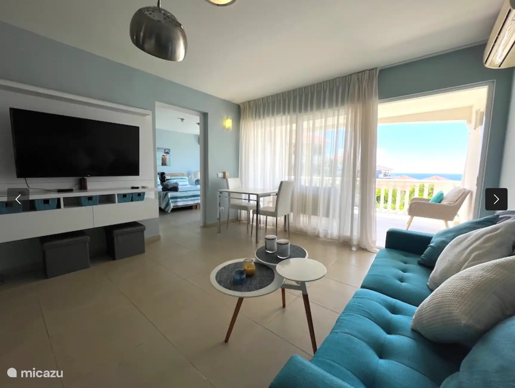 living room with air conditioning and iptv with sea view