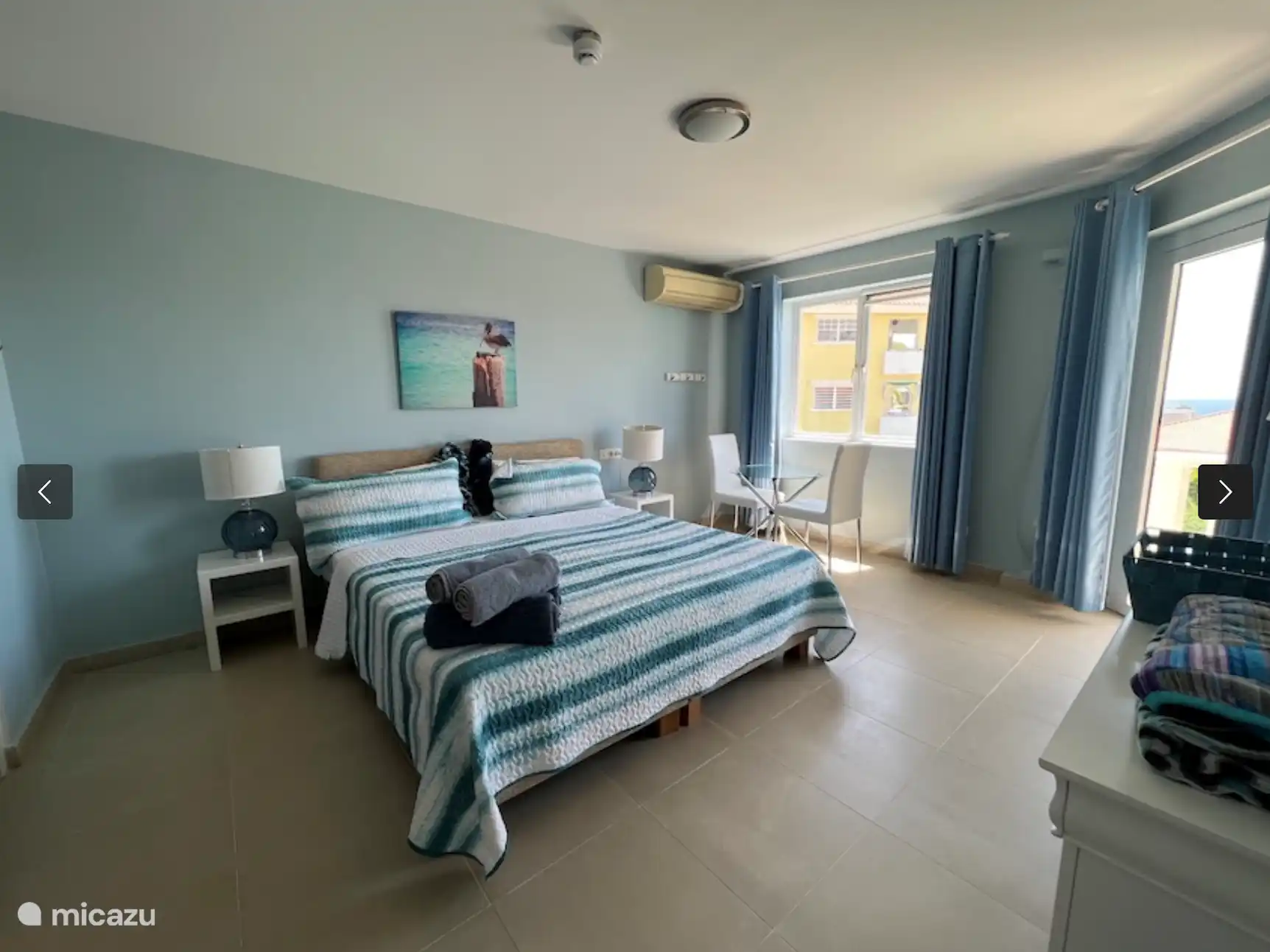 bedroom with air conditioning and sea view