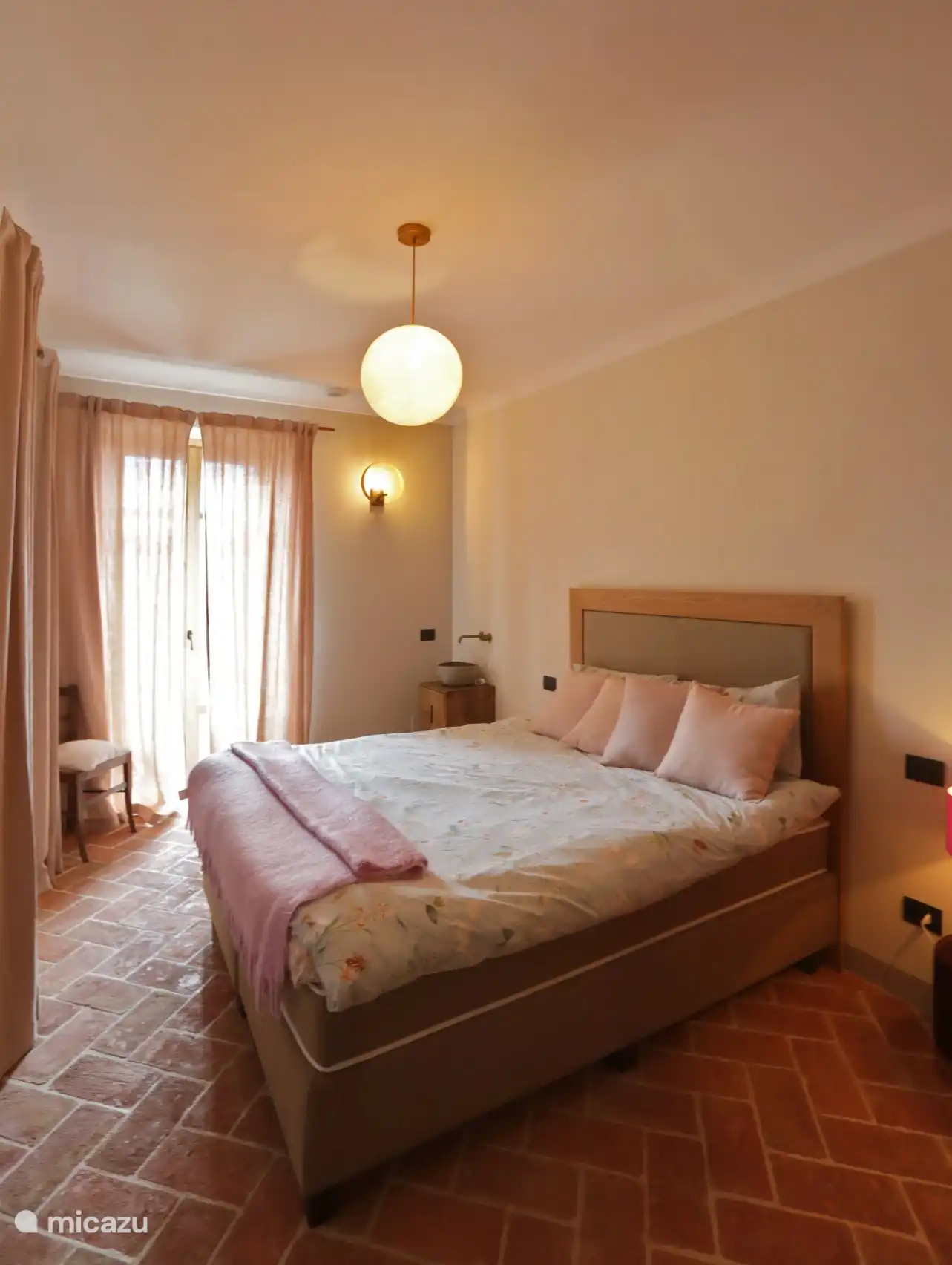 Slaapkamer met balkon