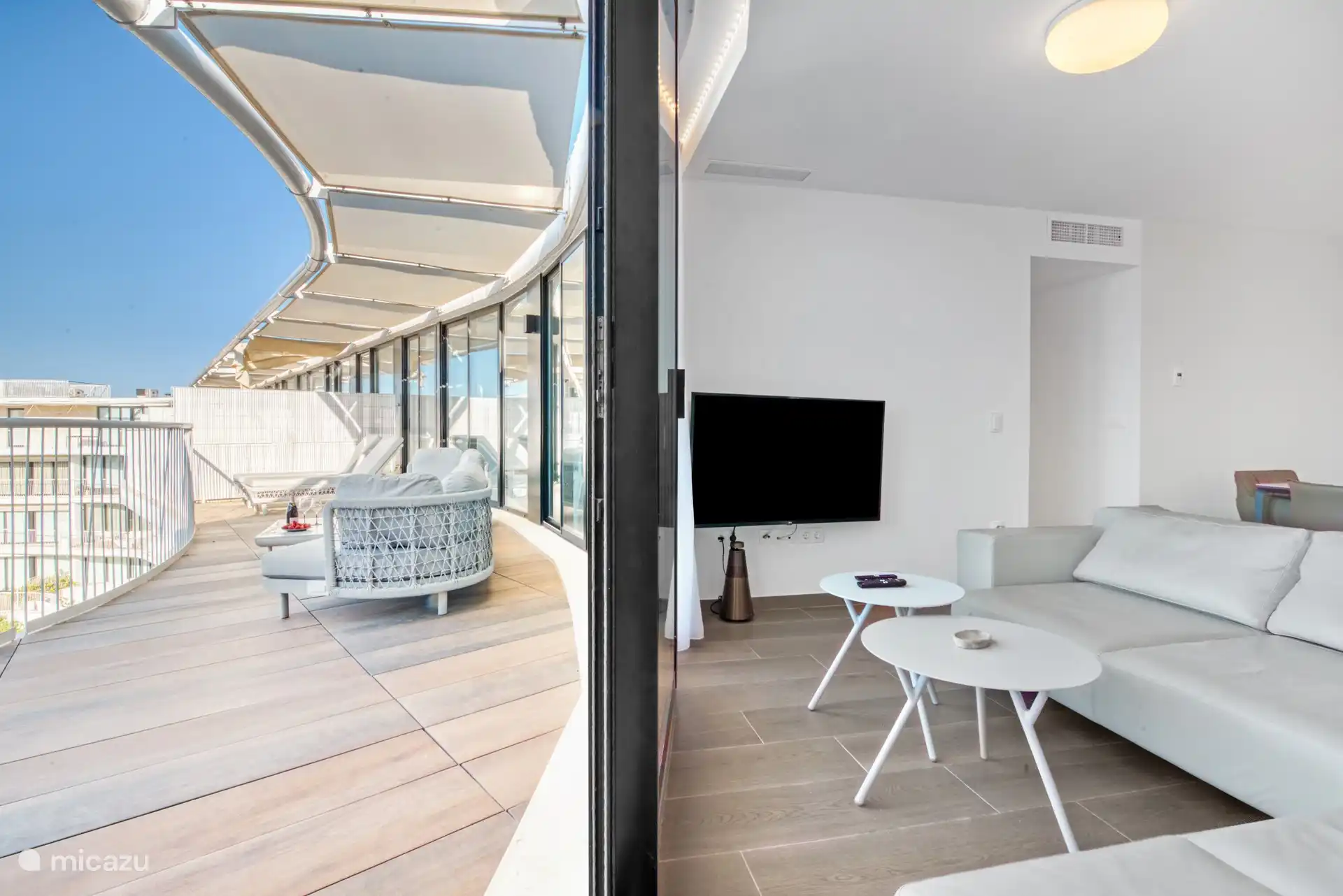 photo taken from living room with a view of the living room and terrace.