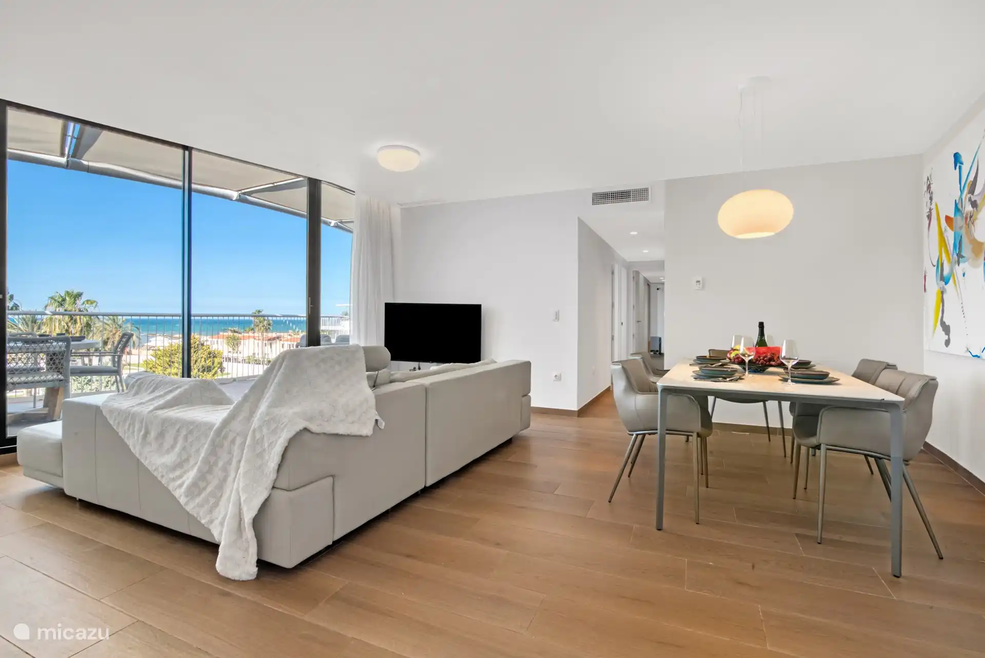 This is the photo of the living room. Also a beautiful view from the living room. It is still a pleasure to see a white sea early in the morning, which changes color to deep blue during the day.