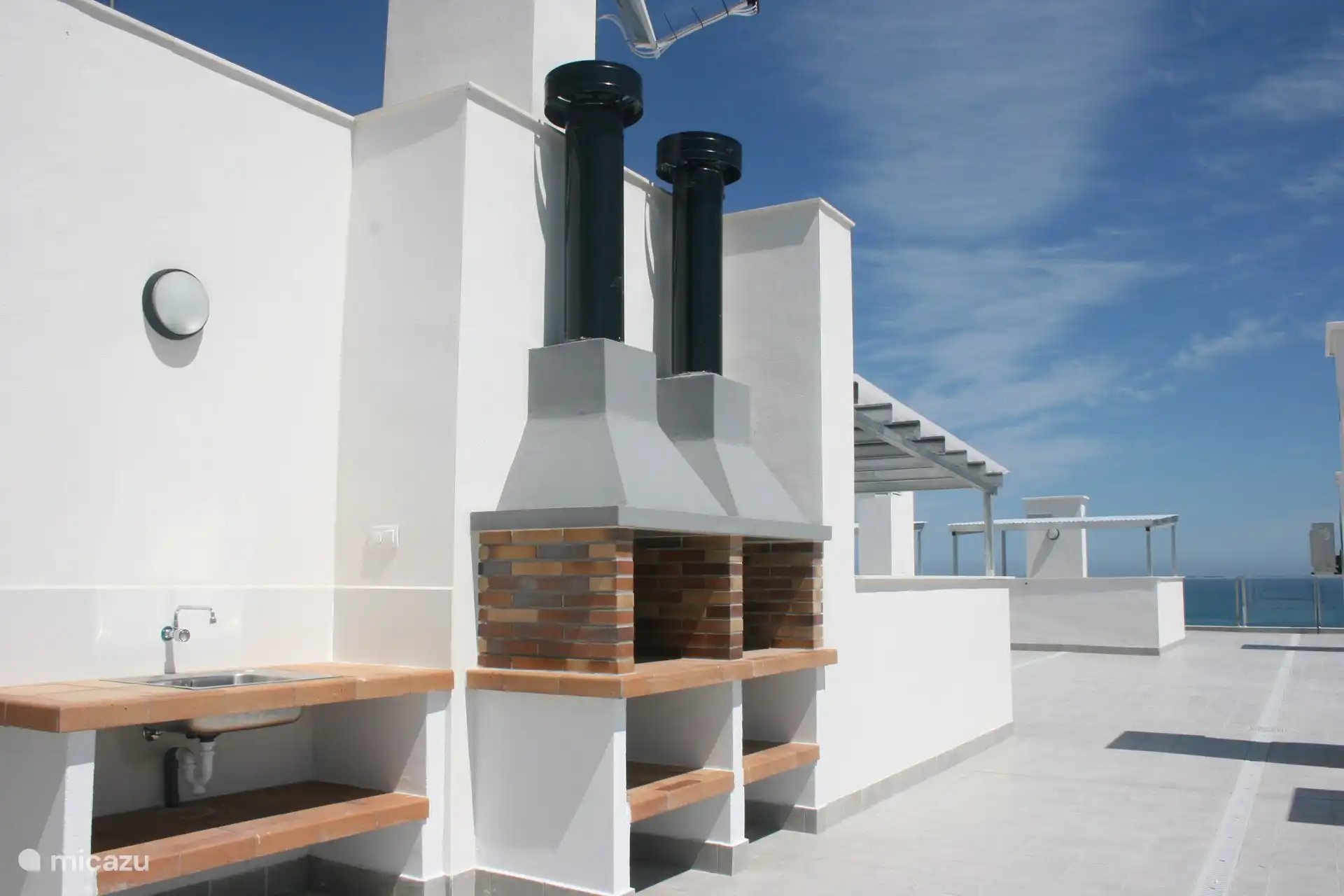 Gemeinschaftsdachterrasse mit Grillmöglichkeiten