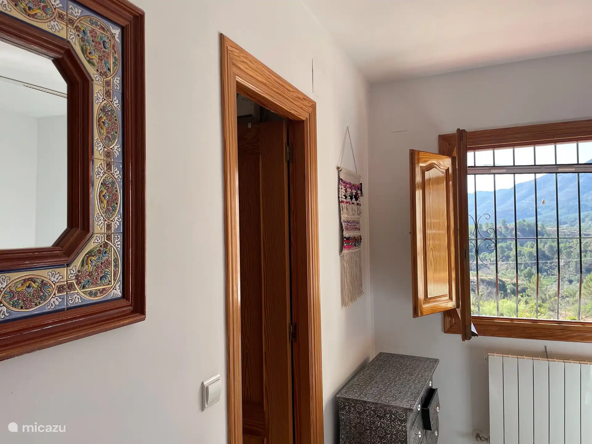 Reflect or enjoy the view in the master bedroom.