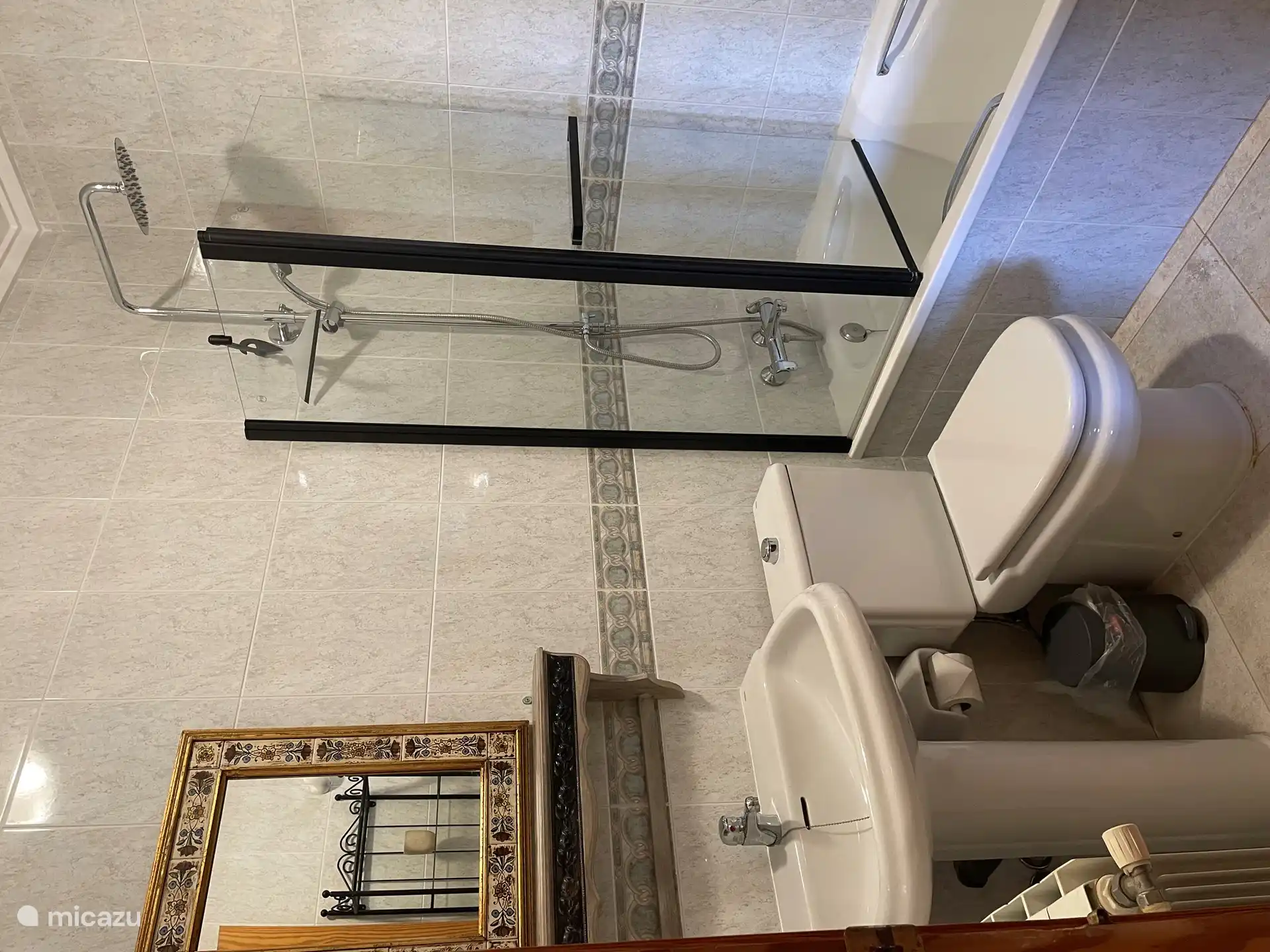 Bathroom 2 in the guest room with bath/shower, sink, toilet. 