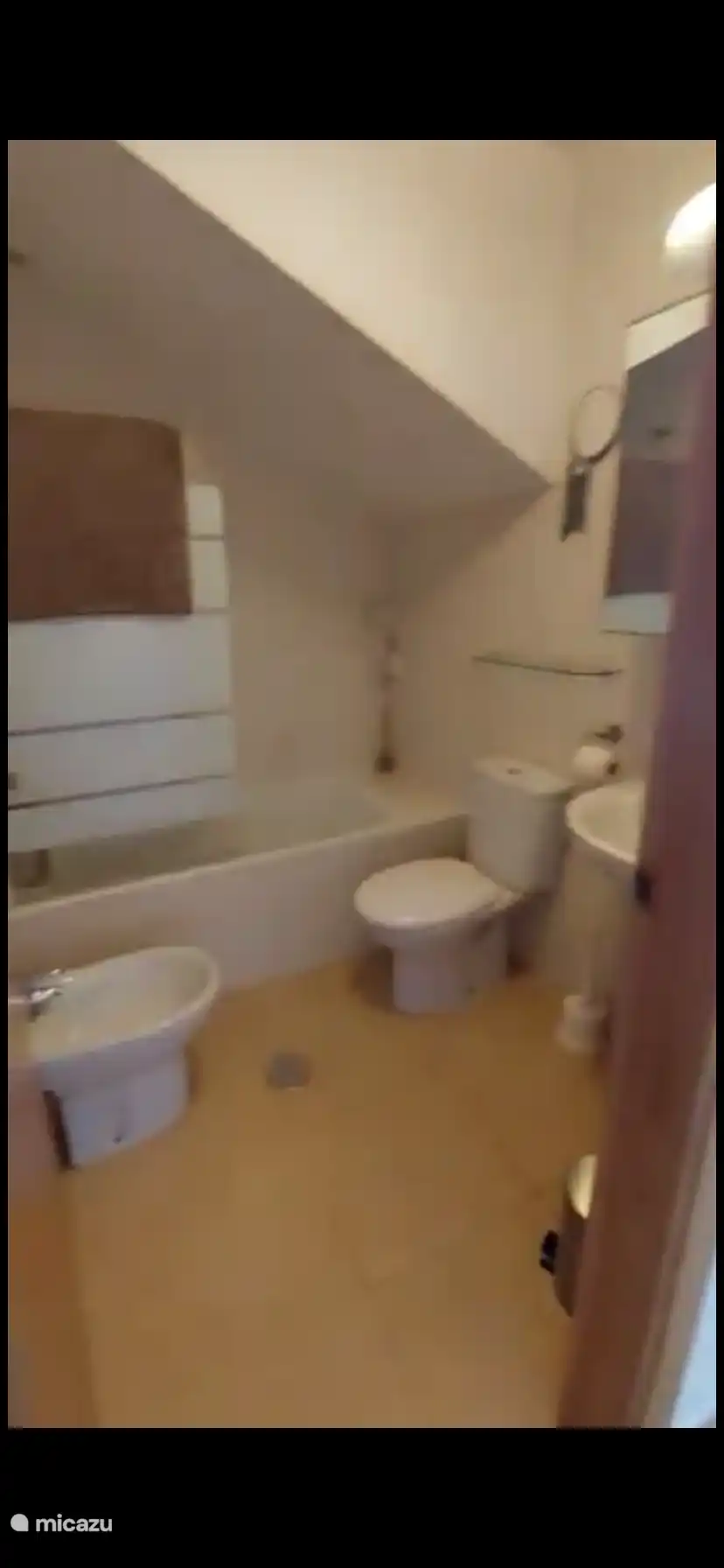 Bathroom with toilet and bath