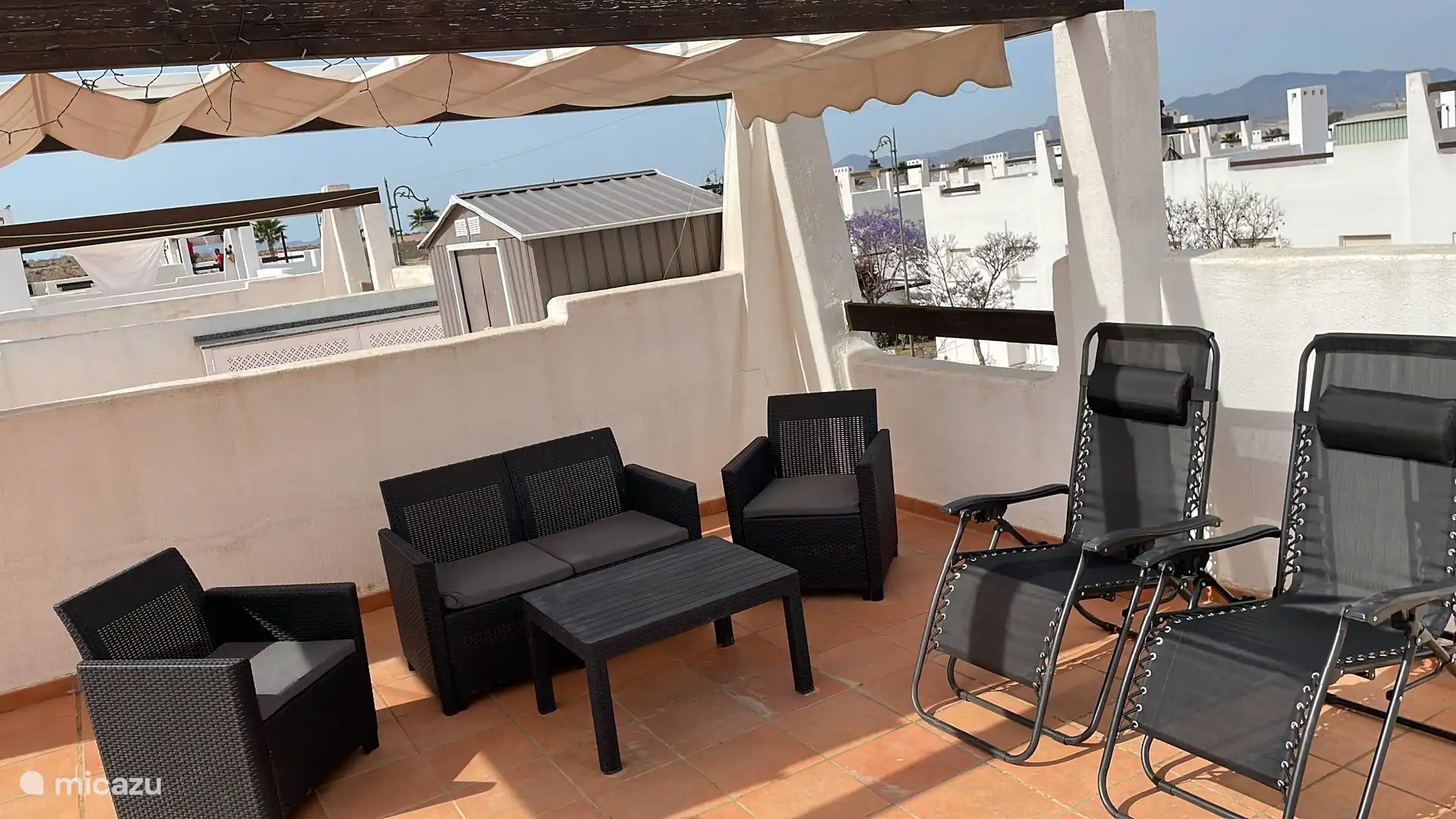 Lounge set under shade cloth