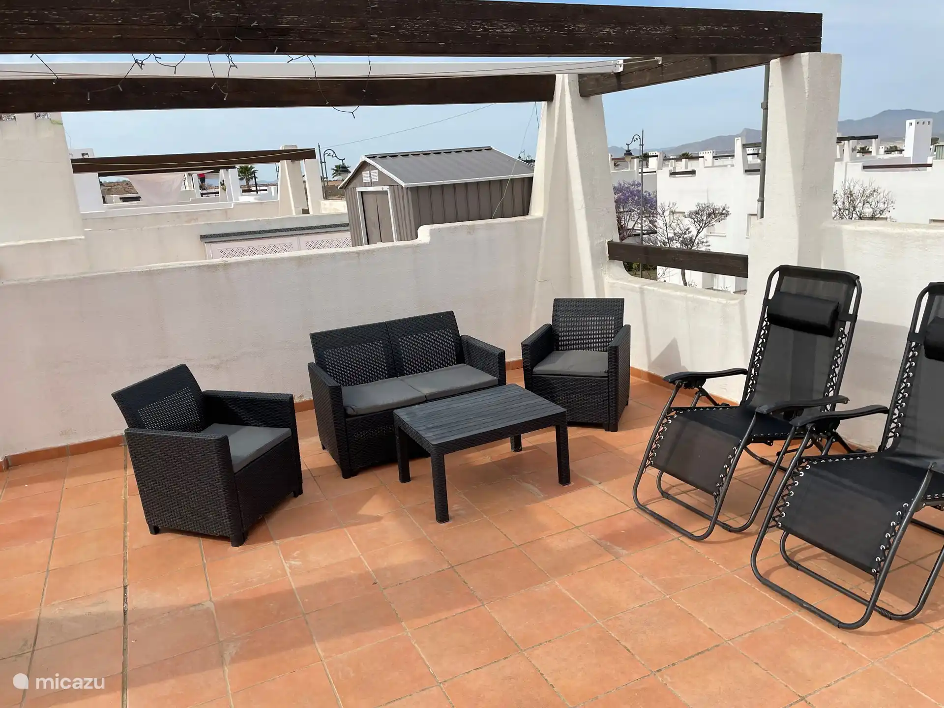 Lounge set and sun loungers