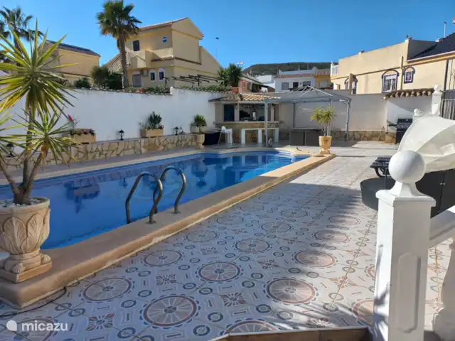 Villa Casa Familia Thijssen en España, Costa Cálida, Camposol - villa Vista de la piscina desde los árboles frutales