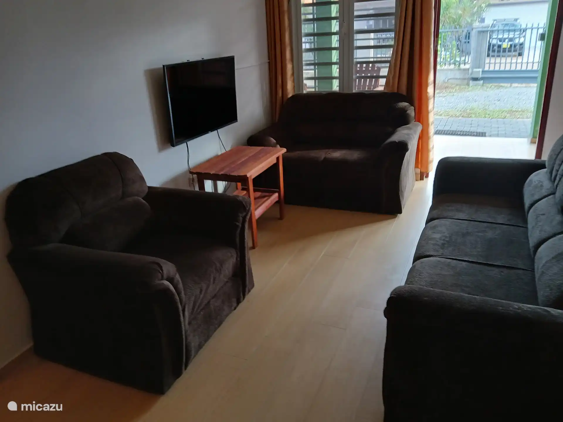 The living room with a spacious and comfortable sofa