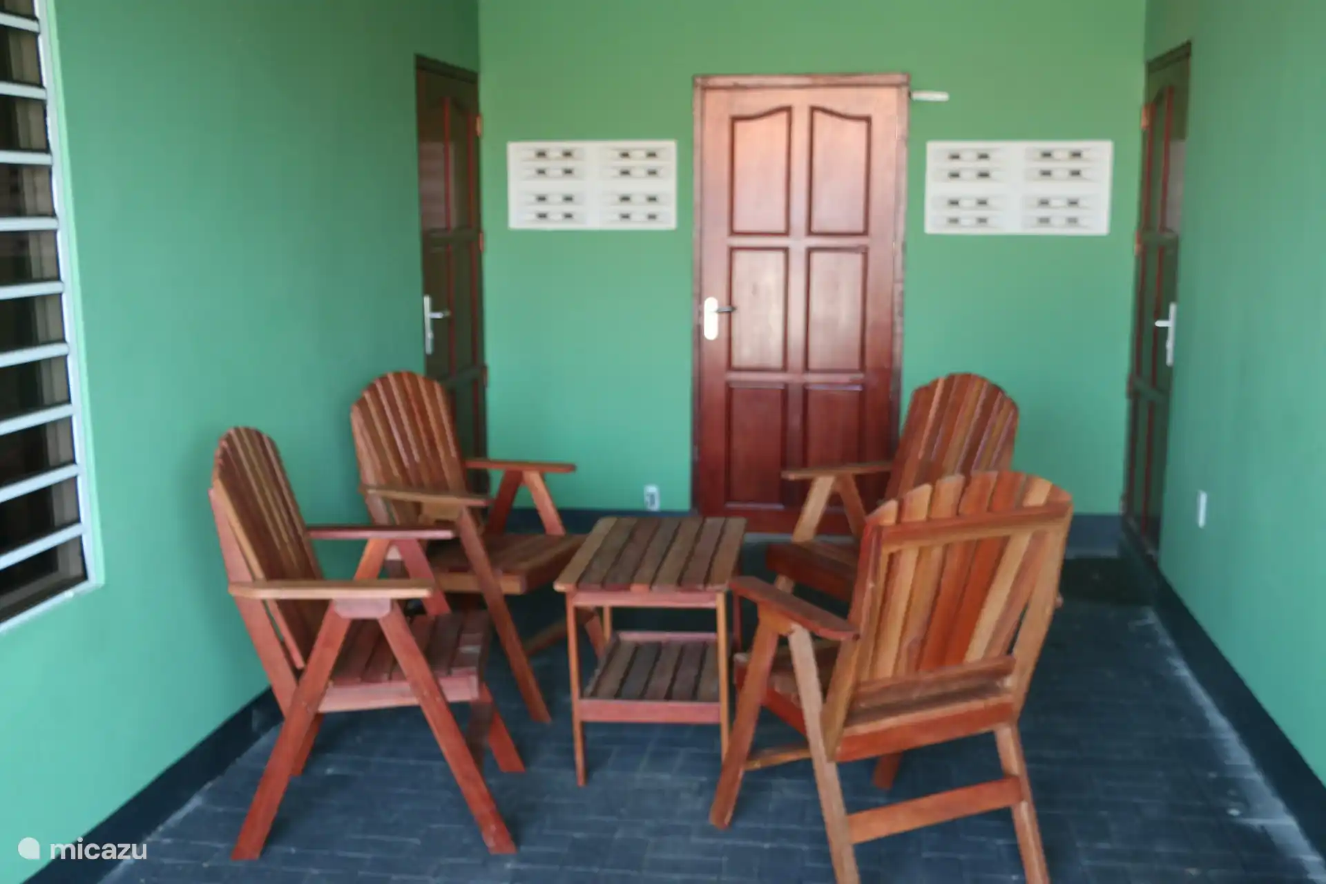 The inner terrace. Here are 2 tables and 8 chairs.