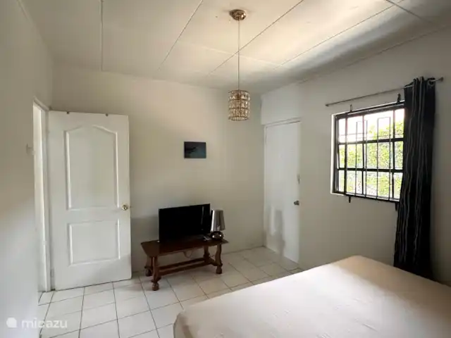 Location de Vacances Curaçao, Curaçao-Centre, Dominguito, appartement - Appartement Océan - Kenepa Resort Chambre avec TV.
