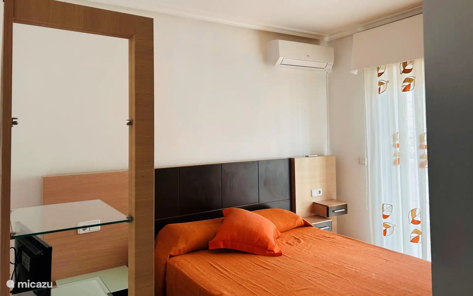 Kamer met tweepersoonsbed op de bovenste verdieping 