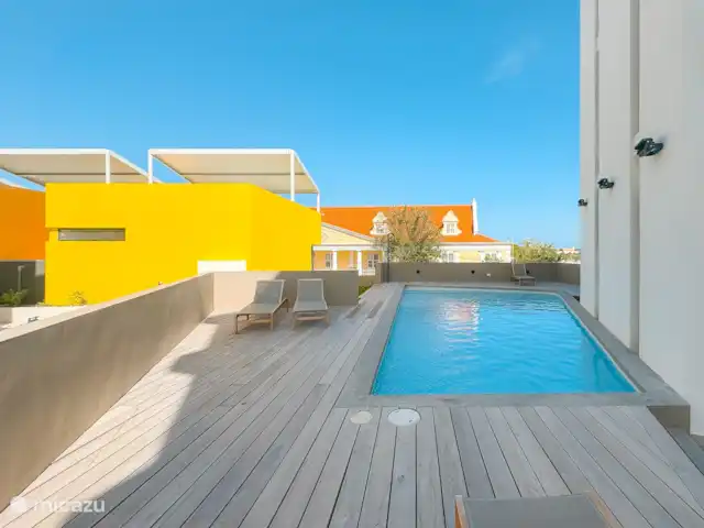 Location de Vacances Curaçao, Curaçao-Centre, Willemstad, appartement - L’appartement de luxe The Wharf MT Piscine commune.