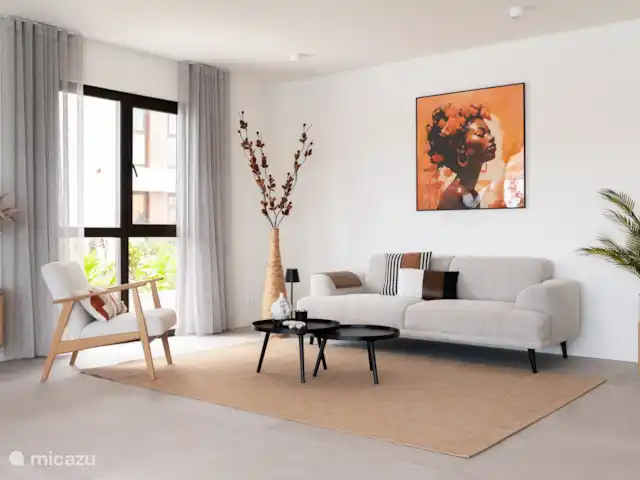 Location de Vacances Curaçao, Curaçao-Centre, Willemstad, appartement - L’appartement de luxe The Wharf MT Salon avec climatisation.