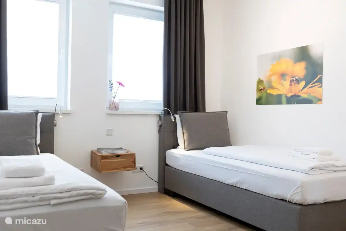 Twee eenpersoonsbedden