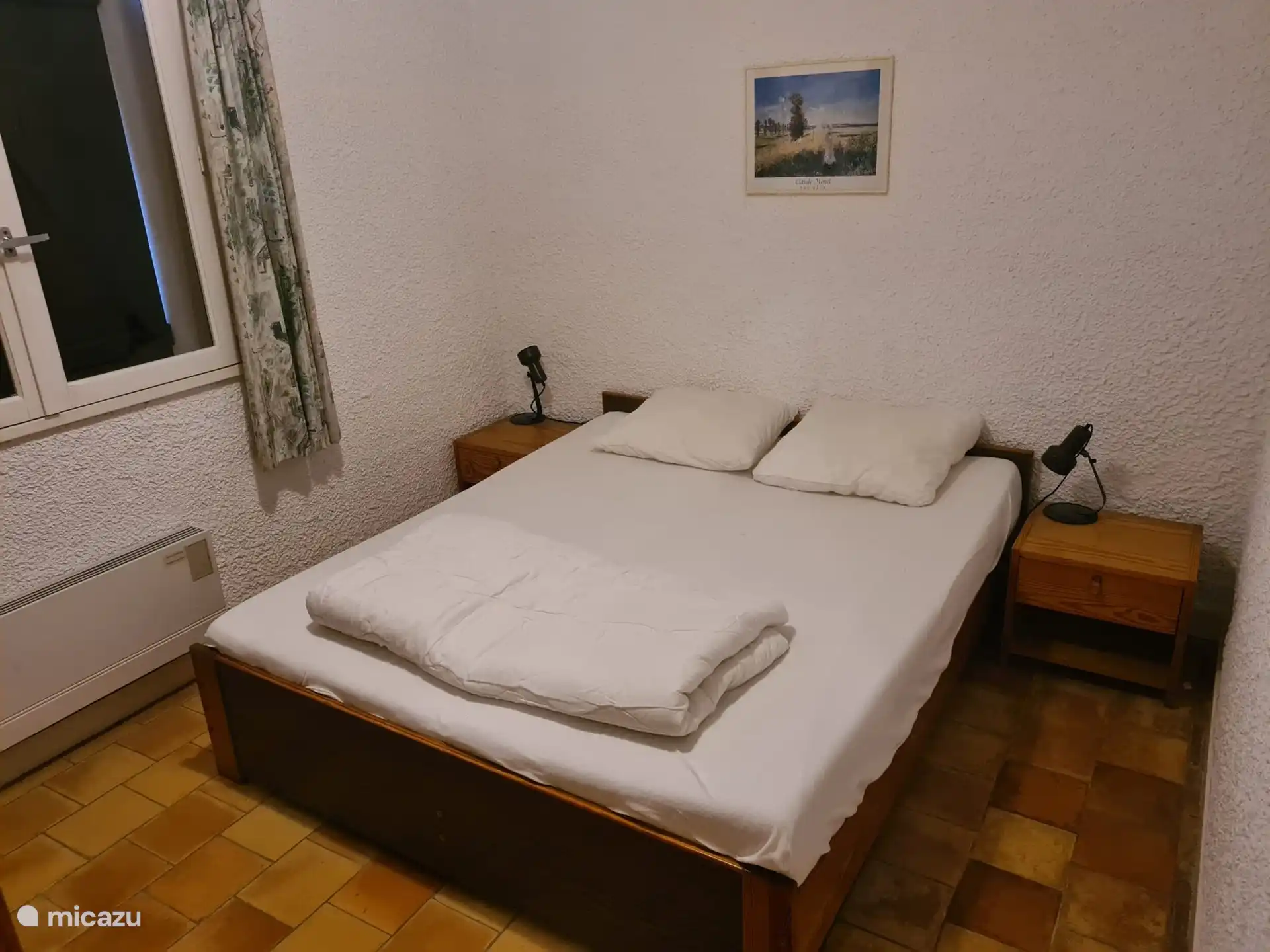 Schlafzimmer 1 mit Doppelbett