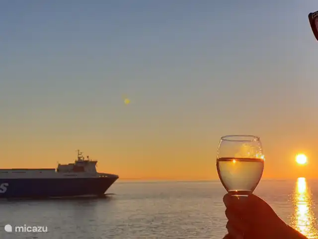 Maison de vacances vue mer | Pays-Bas, Zélande, Flessingue - maison de vacances Vue depuis le salon. Les fenêtres peuvent s'ouvrir complètement, vous pouvez donc également profiter du soleil, de la mer et de la vue depuis le salon !