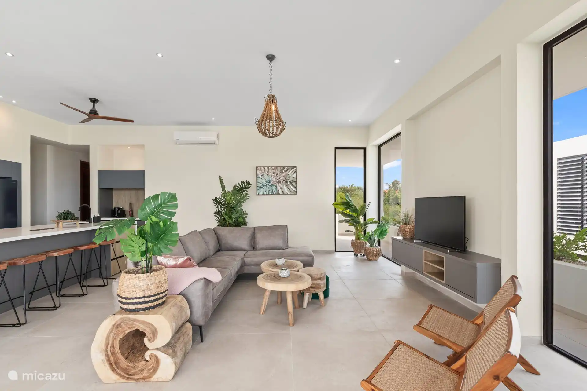 Attractively furnished living room with air conditioning