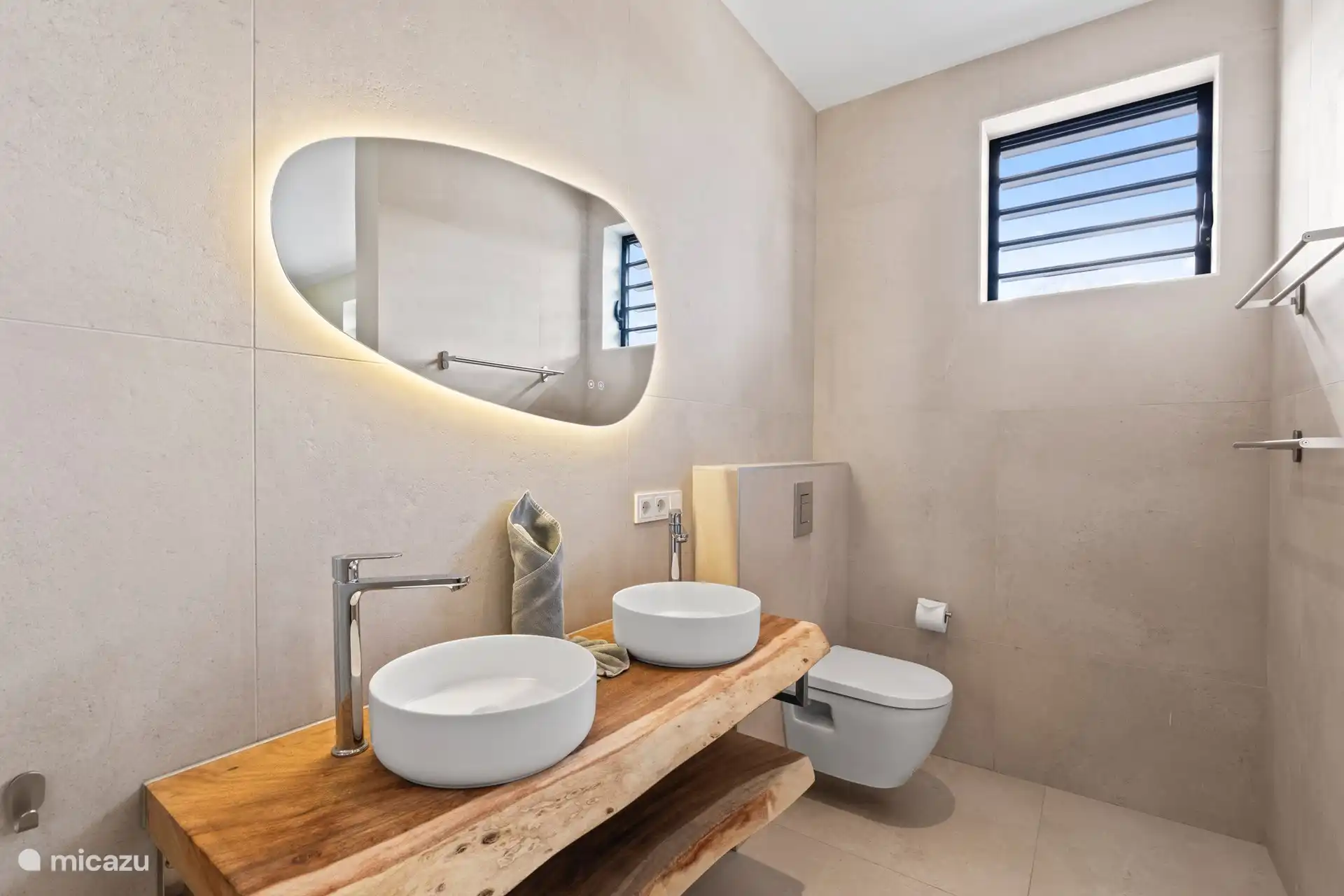 All bathrooms are spacious with shower, toilet and double sink